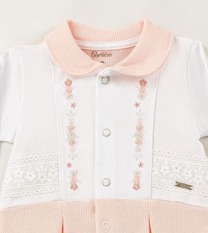 Macacão Botões de Flores Rosa